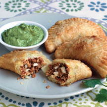 Chorizo and Cheese Empanadas with Avocado Crema