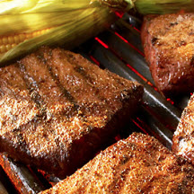Flat Iron Steaks with Grilled Corn and Cumin-Lime Butter