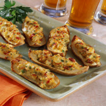 Cheesy Potato Skins with Sun-Dried Tomatoes