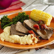 Grilled Cajun Chuck Roast with Spicy Cheddar Grits