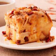 Praline Topped Apple Cranberry Bread Pudding with Butter Rum Sauce