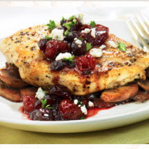 Pan Seared Chicken Breasts with Cranberry Cherry Sauce and Bleu Cheese Crumbles